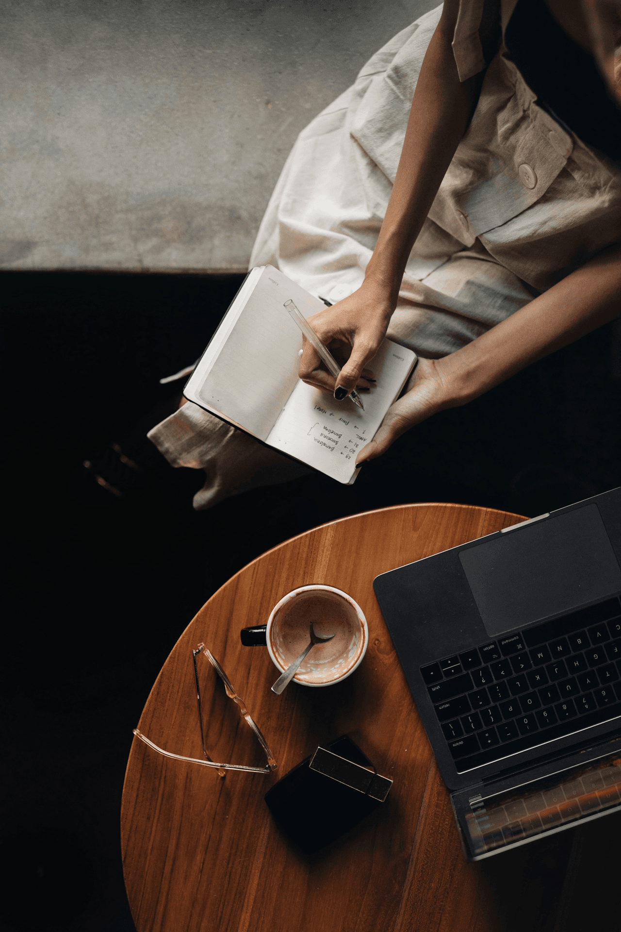 Person writing in journal